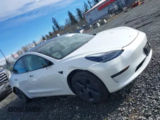 2021 Tesla Model 3 Standard Range Plus z VIN 5YJ3E1EAXMF871730, wystawiony jako IAAI lot #41794274 z przebiegiem 18 791 mil mil oraz . Historia ofert i sprzedaży dostępna na DreamBid. Obrazek 13.