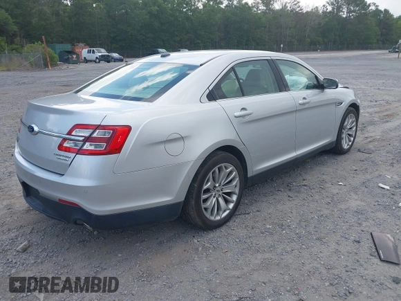 2015 Ford Taurus Limited with VIN 1FAHP2F89FG182598, listed as a IAAI auction lot 42222372 with 124,627 mi miles and . Bid and sale history available at DreamBid. Image 4.