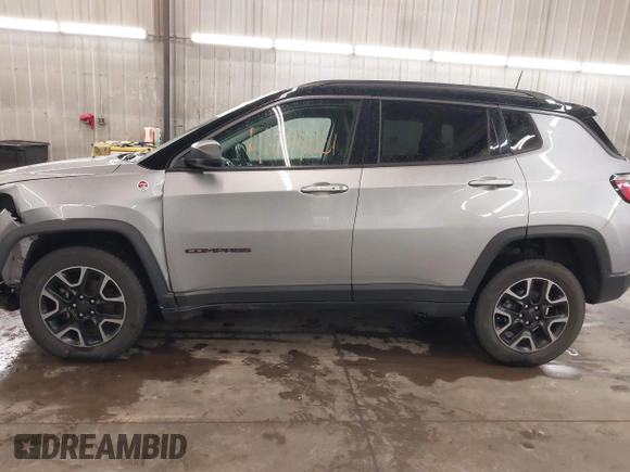 2019 Jeep Compass Trailhawk with VIN 3C4NJDDB8KT667863, listed as a IAAI auction lot 41944001 with 80,635 mi miles and . Bid and sale history available at DreamBid. Image 15.