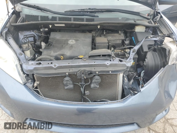 2014 Toyota Sienna XLE with VIN 5TDYK3DC2ES520840, listed as a Copart auction lot 59672295 with 194,143 mi miles and Salvage title. Bid and sale history available at DreamBid. Image 12.