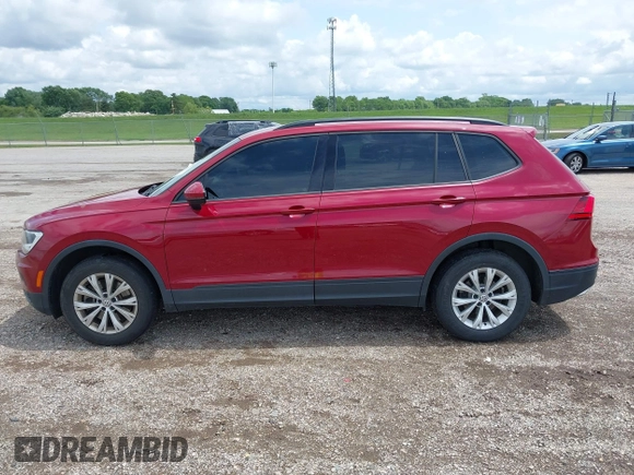 2018 Volkswagen Tiguan S with VIN 3VV1B7AX3JM045193, listed as a IAAI auction lot 42311886 with 69,049 mi miles and . Bid and sale history available at DreamBid. Image 14.