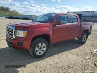 2015 GMC Canyon 4WD SLE z VIN 1GTG6BE3XF1152348, wystawiony jako Copart lot #55659505 z przebiegiem 168 751 mil mil oraz Nie do naprawy • Non repairable. Historia ofert i sprzedaży dostępna na DreamBid. Obrazek 1.