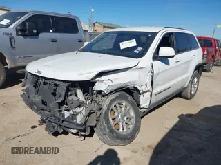 2018 Jeep Grand Cherokee Laredo E with VIN 1C4RJEAG2JC428990, listed as a IAAI auction lot 41218996 with 123,758 mi miles. Bid and sale history available at carsss.com. Image 18.