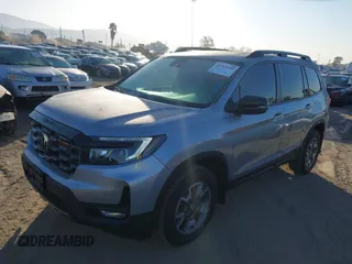 2023 Honda Passport TrailSport with VIN 5FNYF8H61PB028829, listed as a IAAI auction lot 41968490 with 20,090 mi miles. Bid and sale history available at carsss.com. Image 2.