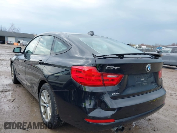2014 BMW 3 Series 328i Gran Turismo xDrive z VIN WBA3X5C51ED558871, wystawiony jako IAAI lot #41940706 z przebiegiem 74 126 mil mil oraz . Historia ofert i sprzedaży dostępna na DreamBid. Obrazek 3.
