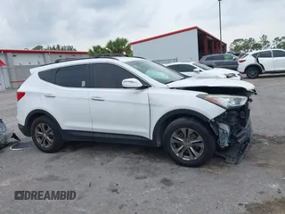 2014 Hyundai Santa Fe with VIN 5XYZU3LB9EG229255, listed as a IAAI auction lot 42407410 with 201,523 mi miles and . Bid and sale history available at DreamBid. Image 14.