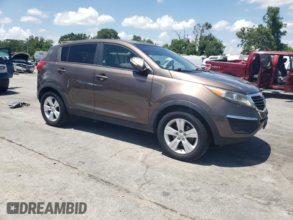 2012 Kia Sportage LX with VIN KNDPB3A20C7276250, listed as a Copart auction lot 61804995 with 112,303 mi miles and Salvage title. Bid and sale history available at DreamBid. Image 4.