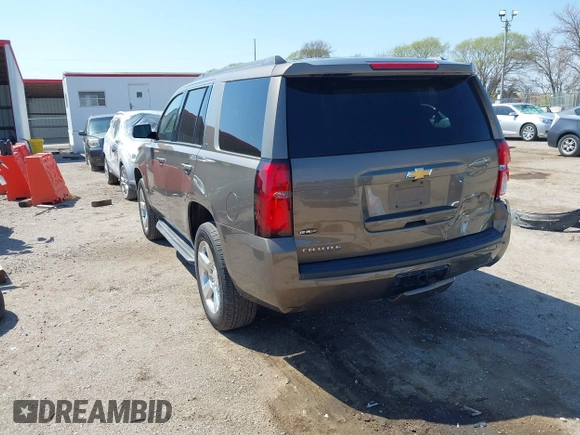 2016 Chevrolet Tahoe LT with VIN 1GNSKBKC9GR434579, listed as a IAAI auction lot 42080094 with 137,910 mi miles and . Bid and sale history available at DreamBid. Image 3.