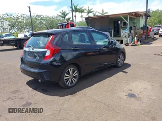 2015 Honda Fit EX-L with VIN 3HGGK5H89FM706018, listed as a IAAI auction lot 42417637 with 36,556 mi miles and . Bid and sale history available at DreamBid. Image 4.