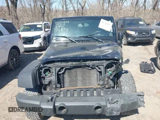 2009 Jeep Wrangler X with VIN 1J4FA24109L754379, listed as a IAAI auction lot 41754925 with 132,500 mi miles and . Bid and sale history available at DreamBid. Image 12.