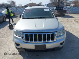 2011 Jeep Grand Cherokee Laredo z VIN 1J4RR4GG3BC589578, wystawiony jako IAAI lot #41804883 z przebiegiem 113 016 mil mil oraz . Historia ofert i sprzedaży dostępna na DreamBid. Obrazek 12.