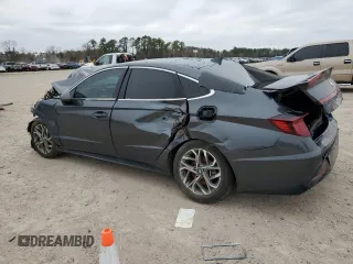 2023 Hyundai Sonata SEL with VIN KMHL64JA1PA279873, listed as a Copart auction lot 46593295 with 56,390 mi miles and Non Repairable. Bid and sale history available at DreamBid. Image 2.