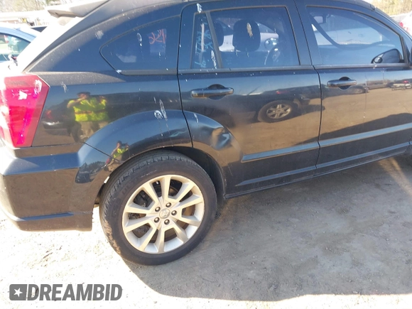 2011 Dodge Caliber Heat with VIN 1B3CB5HA3BD160968, listed as a IAAI auction lot 41770156 with 176,259 mi miles and . Bid and sale history available at DreamBid. Image 6.