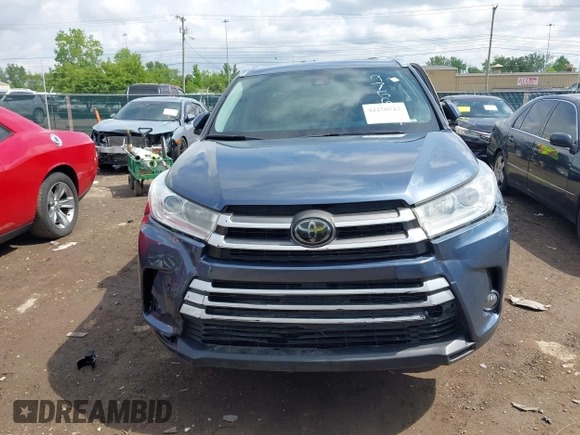 2019 Toyota Highlander SE with VIN 5TDJZRFH2KS975689, listed as a IAAI auction lot 42250723 with 88,043 mi miles and . Bid and sale history available at DreamBid. Image 12.
