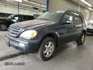 2003 Mercedes-Benz M 500 with VIN 4JGAB75E23A401183, listed as a Copart auction lot 65615515 with 214,281 mi miles and Clean title. Bid and sale history available at DreamBid. Image 1.