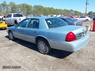 2008 Mercury Grand Marquis LS with VIN 2MEHM75V88X618599, listed as a IAAI auction lot 41698391 with 238,557 mi miles. Bid and sale history available at carsss.com. Image 3.