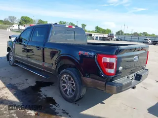 2021 Ford F-150 XL with VIN 1FTFW1E83MFD05167, listed as a IAAI auction lot 39005032 with 57,659 mi miles. Bid and sale history available at carsss.com. Image 3.