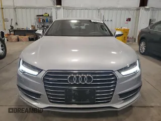 2016 Audi A7 3.0 Prestige with VIN WAU2GAFC7GN104801, listed as a Copart auction lot 64997833 with 74,427 mi miles. Bid and sale history available at carsss.com. Image 5.