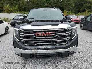 2023 GMC Sierra 1500 SLT z VIN 3GTUUDE87PG106169, wystawiony jako Copart lot #71252284 z przebiegiem 29 136 mil mil oraz Szkoda całkowita • Salvage title. Historia ofert i sprzedaży dostępna na DreamBid. Obrazek 5.