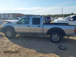 2003 Nissan Frontier SE z VIN 1N6ED29X23C450948, wystawiony jako IAAI lot #41902685 z przebiegiem 209 330 mil mil oraz . Historia ofert i sprzedaży dostępna na DreamBid. Obrazek 14.