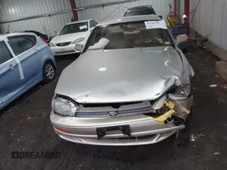 1994 Toyota Camry LE with VIN 4T1SK12E3RU863068, listed as a IAAI auction lot 41246198 with 109,786 mi miles. Bid and sale history available at carsss.com. Image 12.