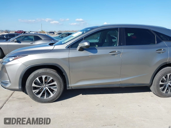 2020 Lexus RX with VIN 2T2AZMAA7LC173478, listed as a IAAI auction lot 41671494 with 91,777 mi miles. Bid and sale history available at carsss.com. Image 14.