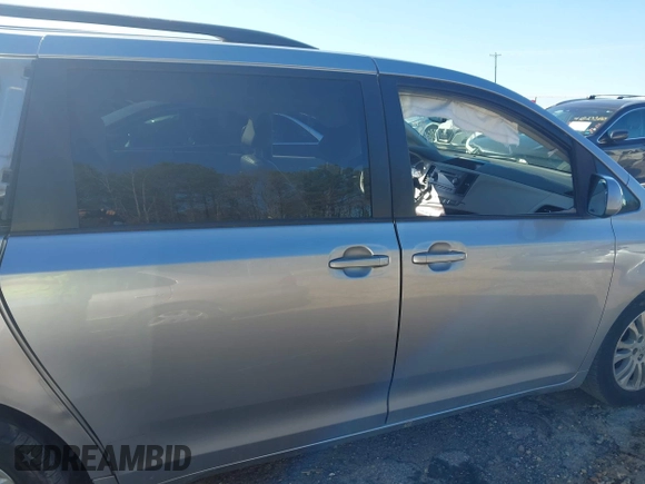 2011 Toyota Sienna XLE AAS with VIN 5TDYK3DC5BS039959, listed as a IAAI auction lot 41803881 with 129,479 mi miles. Bid and sale history available at carsss.com. Image 14.
