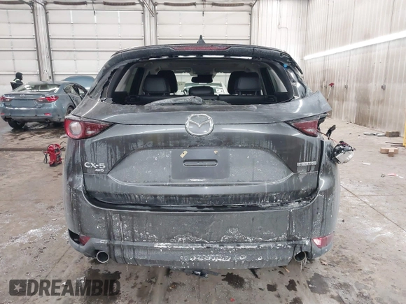 2020 Mazda CX-5 Touring with VIN JM3KFBCM0L0843242, listed as a IAAI auction lot 41536075 with 31,849 mi miles. Bid and sale history available at carsss.com. Image 16.