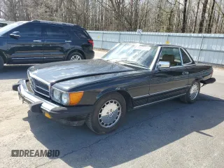 1988 Mercedes-Benz 560 Series 560SL with VIN WDBBA48D0JA085307, listed as a Copart auction lot 51533115 with 83,302 mi miles and Salvage Title. Bid and sale history available at carsss.com. Image 1.