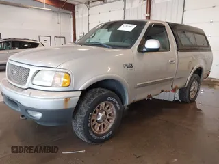 2001 Ford F-150 XL with VIN 2FTRF18W31CB06246, listed as a IAAI auction lot 42307983 with 148,440 mi miles and . Bid and sale history available at DreamBid. Image 2.
