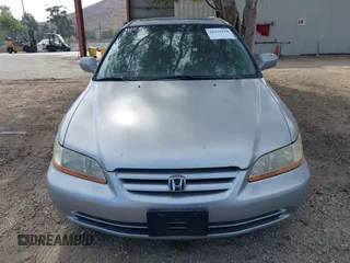 2002 Honda Accord SE z VIN JHMCG66802C027742, wystawiony jako IAAI lot #42373110 z przebiegiem 141 167 mil mil oraz . Historia ofert i sprzedaży dostępna na DreamBid. Obrazek 6.