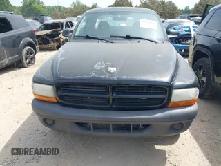 2003 Dodge Dakota z VIN 1D7HL12X73S381323, wystawiony jako IAAI lot #42161329 z przebiegiem 219 083 mil mil oraz . Historia ofert i sprzedaży dostępna na DreamBid. Obrazek 11.