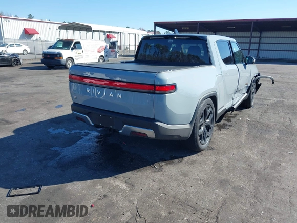 2024 Rivian R1T Adventure z VIN 7FCTGAAA5RN033799, wystawiony jako IAAI lot #41606562 z przebiegiem 9 449 mil mil oraz . Historia ofert i sprzedaży dostępna na DreamBid. Obrazek 4.