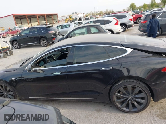 2017 Tesla Model S 100D with VIN 5YJSA1E28HF188981, listed as a IAAI auction lot 42010115 with 76,327 mi miles and . Bid and sale history available at DreamBid. Image 14.