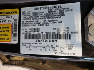 2014 Ford Fusion Titanium with VIN 3FA6P0K94ER231241, listed as a Copart auction lot 47886135 with 70,925 mi miles and Salvage Title. Bid and sale history available at DreamBid. Image 12.