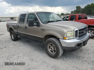 2004 Ford Super Duty F-250 XL with VIN 1FTNW21P04EB78513, listed as a Copart auction lot 68666414 with 187,473 mi miles and Salvage Title. Bid and sale history available at carsss.com. Image 4.