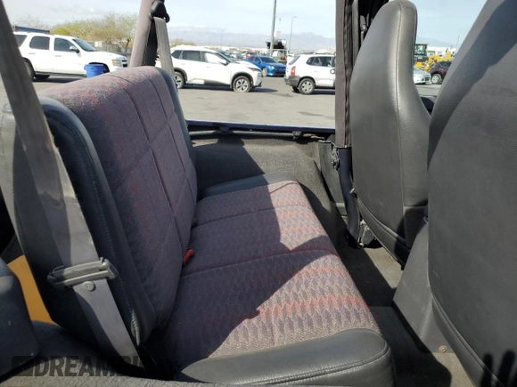 1999 Jeep Wrangler Sport with VIN 1J4FY19S0XP467587, listed as a Copart auction lot 51339415 with 168,142 mi miles and Clean Title. Bid and sale history available at carsss.com. Image 10.