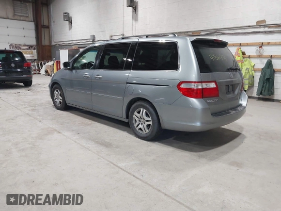 2006 Honda Odyssey EX with VIN 5FNRL38456B101102, listed as a IAAI auction lot 41861721 with 232,819 mi miles. Bid and sale history available at carsss.com. Image 3.