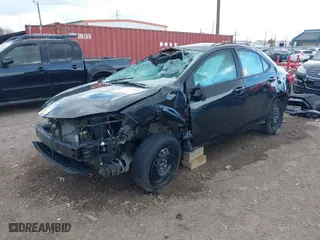 2019 Toyota Corolla L with VIN 5YFBURHE2KP935806, listed as a IAAI auction lot 41673090 with 61,926 mi miles. Bid and sale history available at carsss.com. Image 2.
