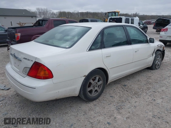 2000 Toyota Avalon XL with VIN 4T1BF28B9YU084201, listed as a IAAI auction lot 42042761 with 240,190 mi miles and . Bid and sale history available at DreamBid. Image 4.