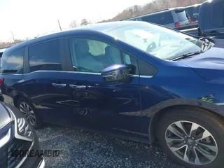 2022 Honda Odyssey EX-L with VIN 5FNRL6H7XNB061061, listed as a IAAI auction lot 41257019 with 52,194 mi miles and . Bid and sale history available at DreamBid. Image 13.