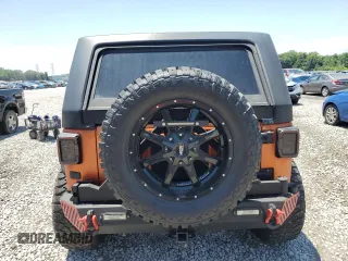 2011 Jeep Wrangler Unlimited Rubicon with VIN 1J4HA6H12BL584493, listed as a Copart auction lot 61765735 with 151,175 mi miles and Salvage title. Bid and sale history available at DreamBid. Image 6.