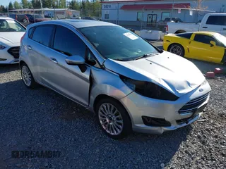 2014 Ford Fiesta Titanium z VIN 3FADP4FJ3EM206363, wystawiony jako IAAI lot #42181032 z przebiegiem 103 315 mil mil oraz . Historia ofert i sprzedaży dostępna na DreamBid. Obrazek 1.