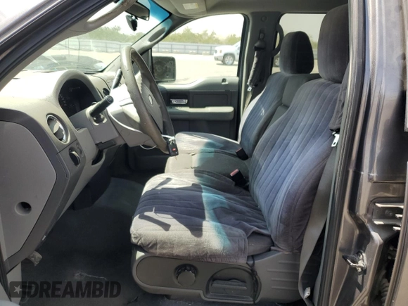 2004 Ford F-150 XLT with VIN 1FTRW12W74KC26169, listed as a Copart auction lot 68393914 with 118,059 mi miles and Salvage Title. Bid and sale history available at DreamBid. Image 7.