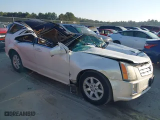 2006 Cadillac SRX with VIN 1GYEE637460146956, listed as a IAAI auction lot 40684269 with 153,301 mi miles. Bid and sale history available at carsss.com. Image 1.