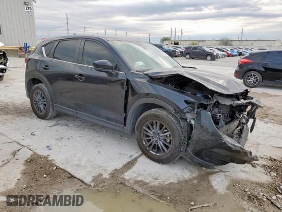 2021 Mazda CX-5 Sport with VIN JM3KFABM7M0325089, listed as a Copart auction lot 50479415 with 137,705 mi miles and Salvage Title. Bid and sale history available at carsss.com. Image 4.