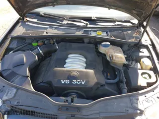 2003 Volkswagen Passat GLX with VIN WVWTH63B43P299509, listed as a IAAI auction lot 41775005 with 137,271 mi miles. Bid and sale history available at carsss.com. Image 10.