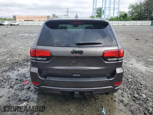 2017 Jeep Grand Cherokee Altitude z VIN 1C4RJFAG9HC720250, wystawiony jako Copart lot #56956155 z przebiegiem 138 879 mil mil oraz Szkoda całkowita • Salvage title. Historia ofert i sprzedaży dostępna na DreamBid. Obrazek 6.
