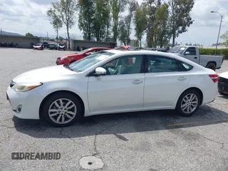 2014 Toyota Avalon Limited z VIN 4T1BK1EB1EU117097, wystawiony jako IAAI lot #41937996 z przebiegiem 169 336 mil mil oraz . Historia ofert i sprzedaży dostępna na DreamBid. Obrazek 14.
