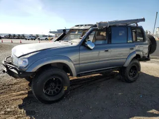 1996 Toyota Land Cruiser with VIN JT3HJ85J0T0145838, listed as a Copart auction lot 77593764 with 158,507 mi miles and Salvage Title. Bid and sale history available at carsss.com. Image 1.